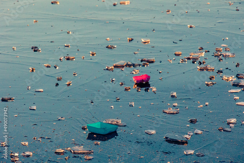 Fototapeta Naklejka Na Ścianę i Meble -  shards of ice nad plastic on a frozen lake