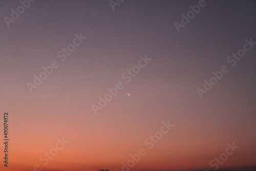 orange-pink sky at dawn, colorful sky, dawn sky background, copy space