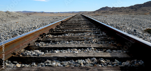 Railway in the desert mountains photo