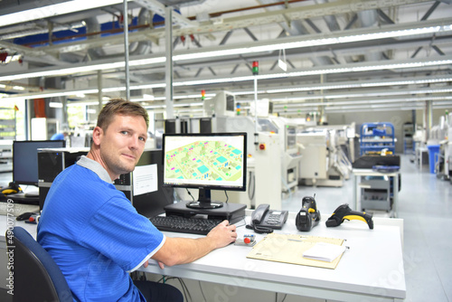 production of electronic components in a modern factory - engineer at the workplace
