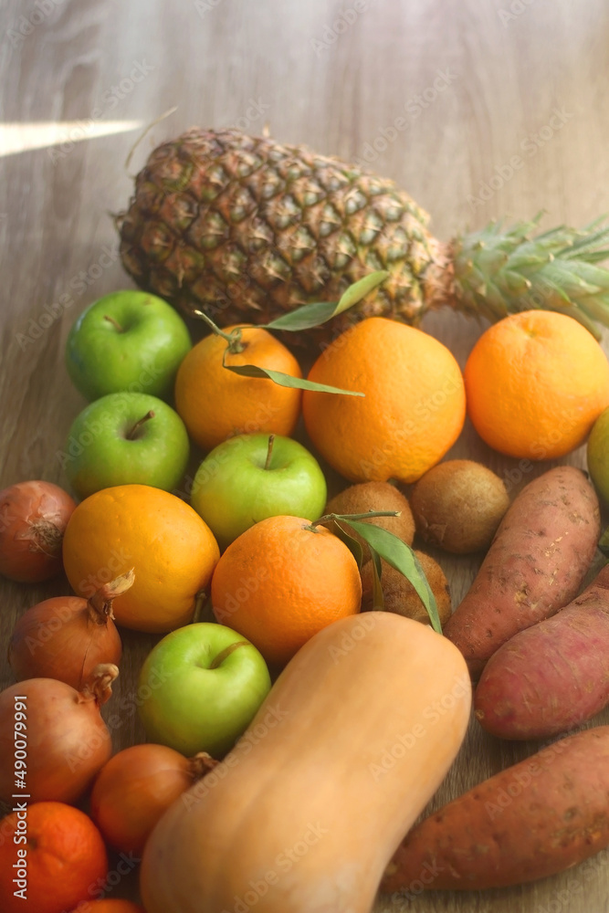 Various healthy fruit and vegetable on wooden background. Selective focus. Various healthy fruit and vegetable on wooden background. Selective focus.