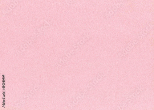 背景用のピンク色の紙のテクスチャ