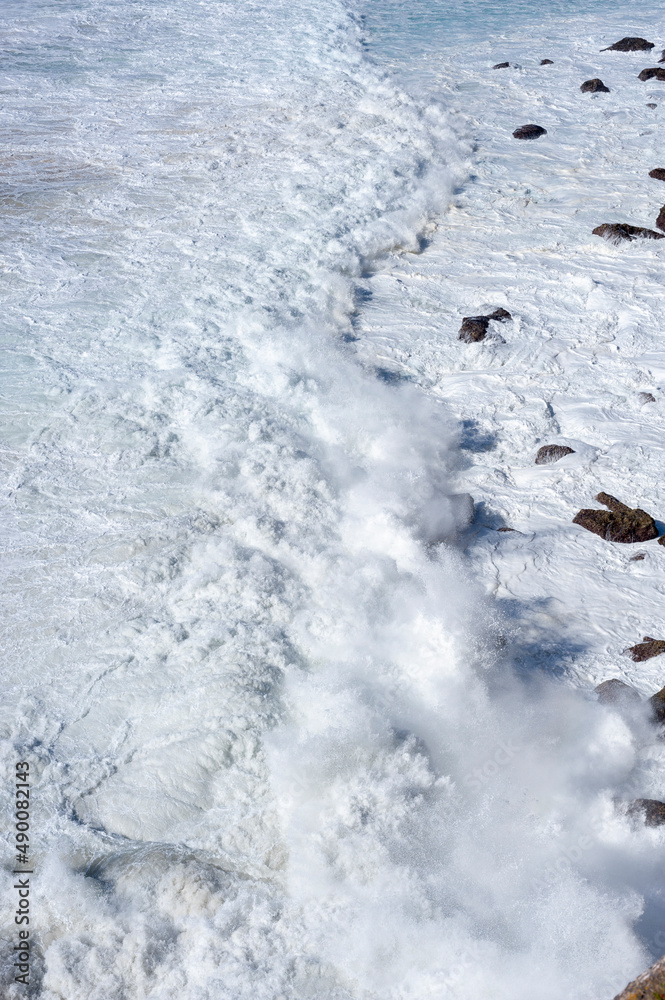 Surge and spume at Cabo de Sao Vicente near Sagres in the Algarve Surge and spume at Cabo de Sao Vicente near Sagres in the Algarve