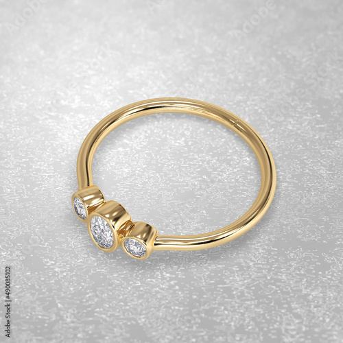 3 stone engagement ring laying down position in yellow gold 3D render