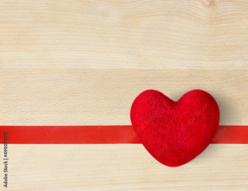 Creative Valentines Day postcard design with red ribbon and heart. Valentine day and love concept Creative Valentines Day postcard design with red ribbon and heart. Valentine day and love concept