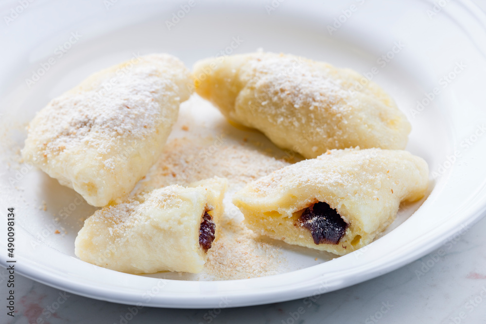 sweet dumplings filled with plum jam sweet dumplings filled with plum jam
