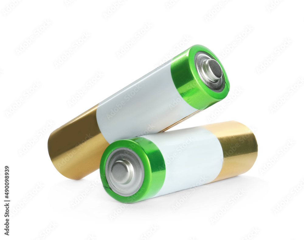 New AA batteries on white background. Dry cell Stock Photo Adobe Stock