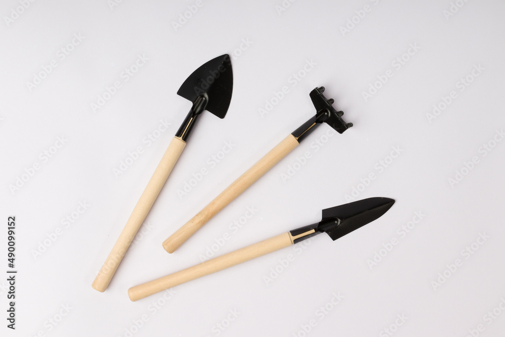 set of tools for gardening on a white background set of tools for gardening on a white background
