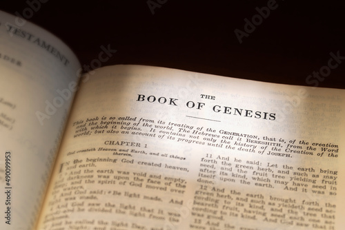 The Holy Bible opened to The Book of Genesis