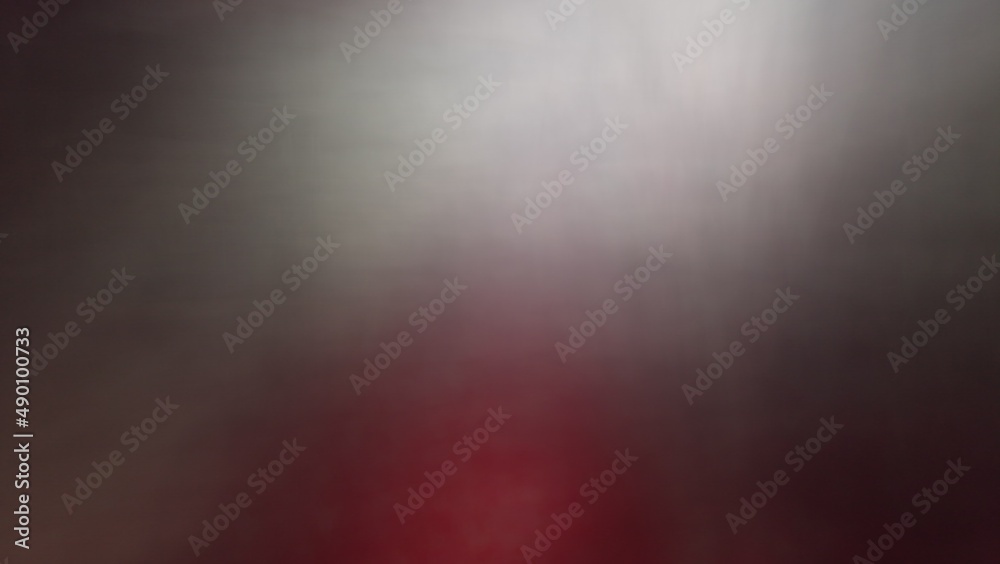 Abstract blur background with gray-brown, black, white, red and earth tones.