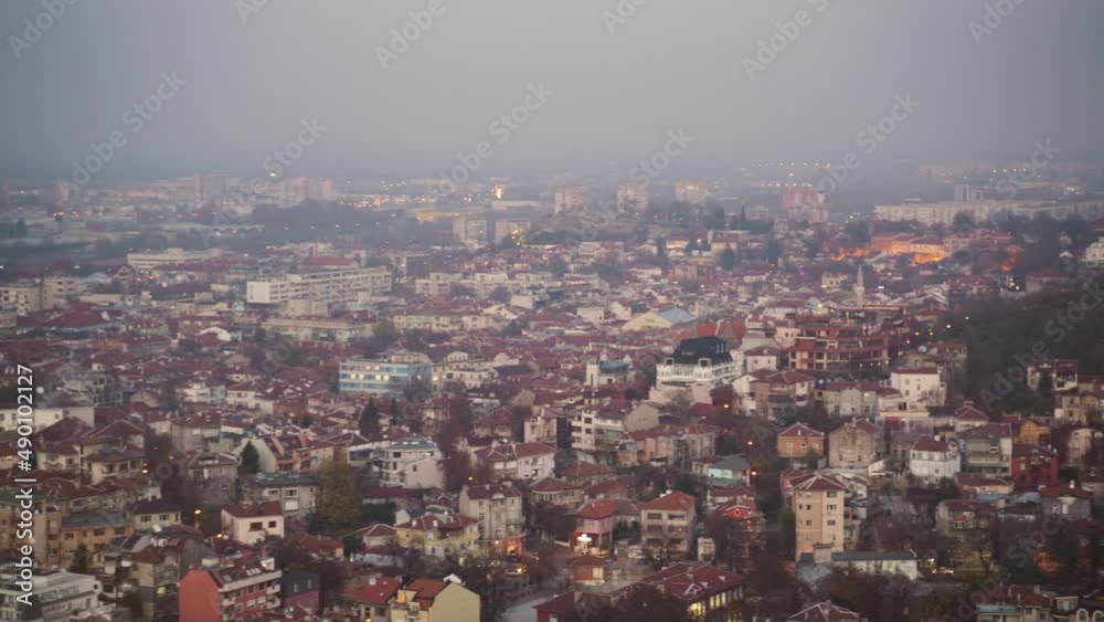 Panorama of Plovdiv after Sunset in Blue Hour when Streetlights are On, Close Up. Smog covers the city. Panorama of Plovdiv after Sunset in Blue Hour when Streetlights are On, Close Up. Smog covers the city.