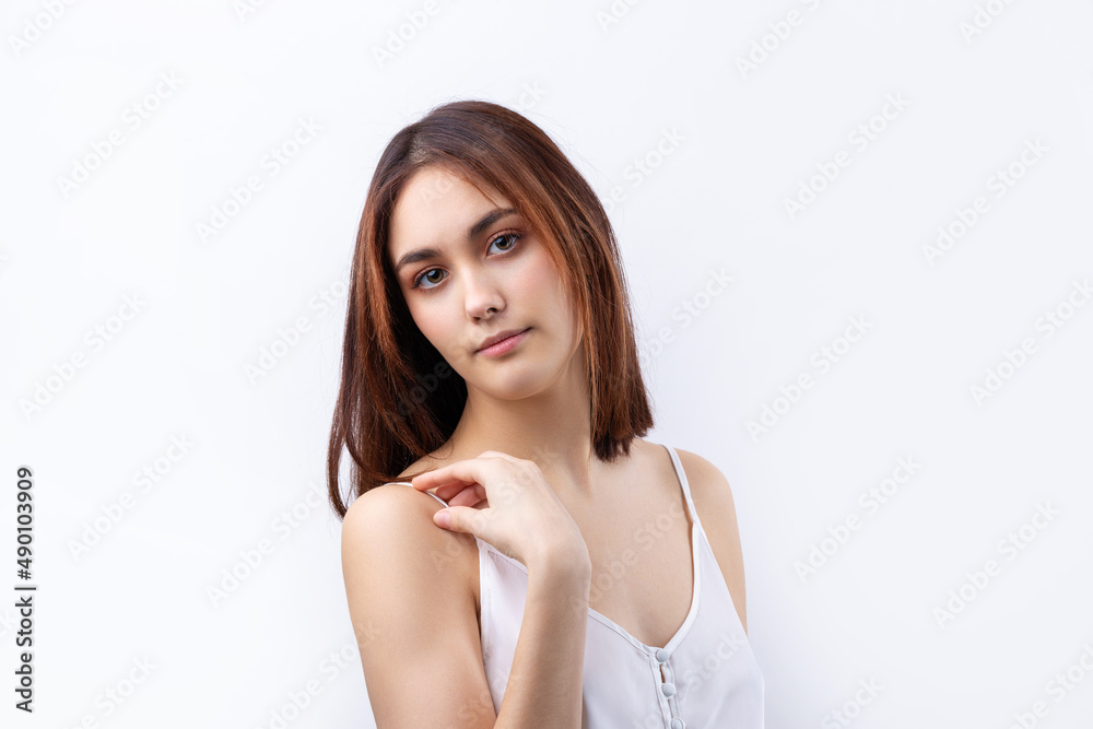 Beautiful smiling woman with clean skin, natural make-up and white teeth on a gray background Beautiful smiling woman with clean skin, natural make-up and white teeth on a gray background