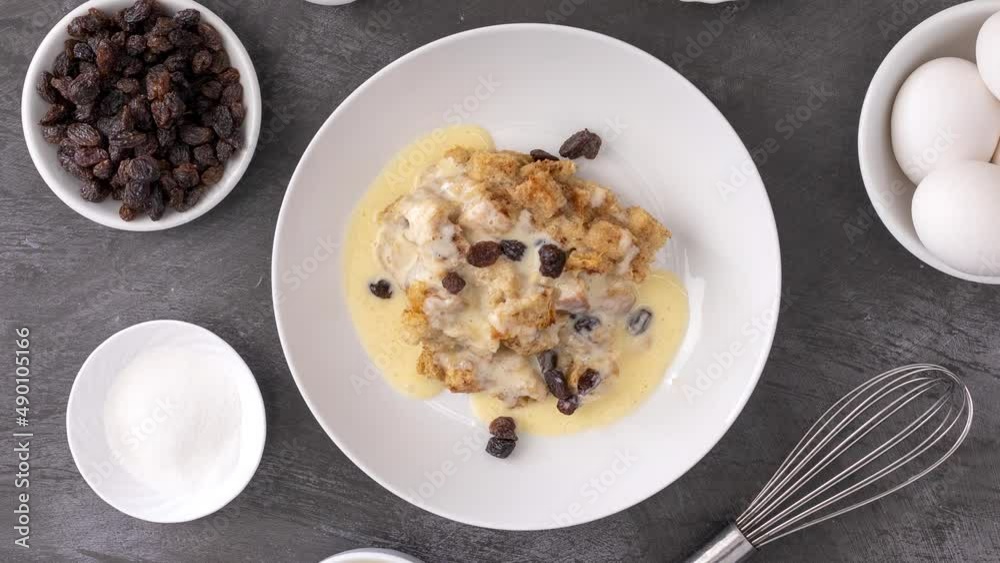 Rotating Plate of Bread Pudding with English Custard Rotating Plate of Bread Pudding with English Custard