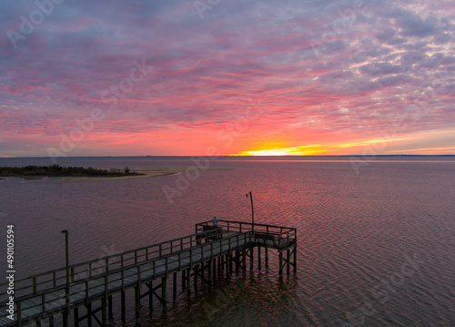 Sunset on the eastern shore of Mobile Bay at sunset in Daphne, Alabama 