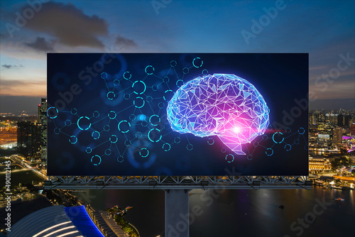 Photography Brain hologram on billboard with Singapore cityscape background at night time