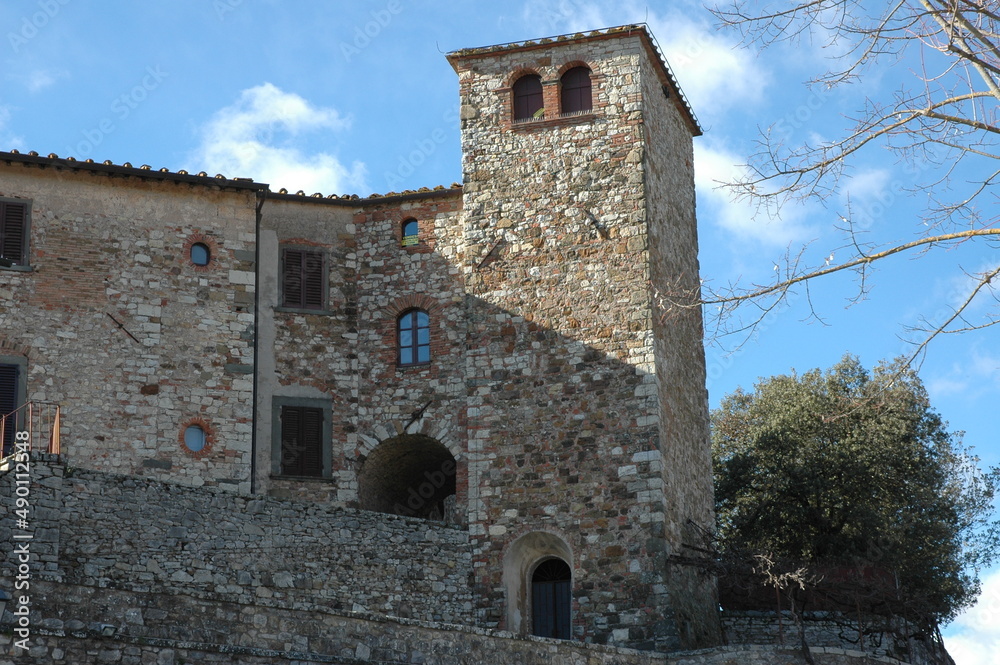 Medieval wall and tower in Radda in Chianti , municipality of the Chianti Nero DocCG wine area 