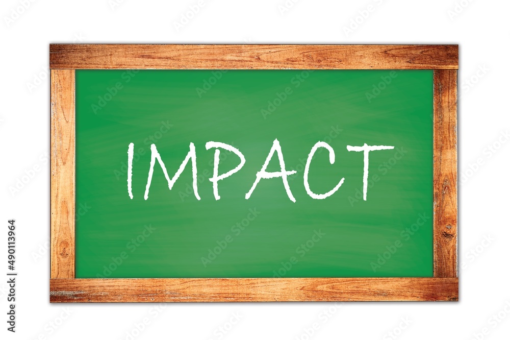 IMPACT text written on green school board. IMPACT text written on green school board.