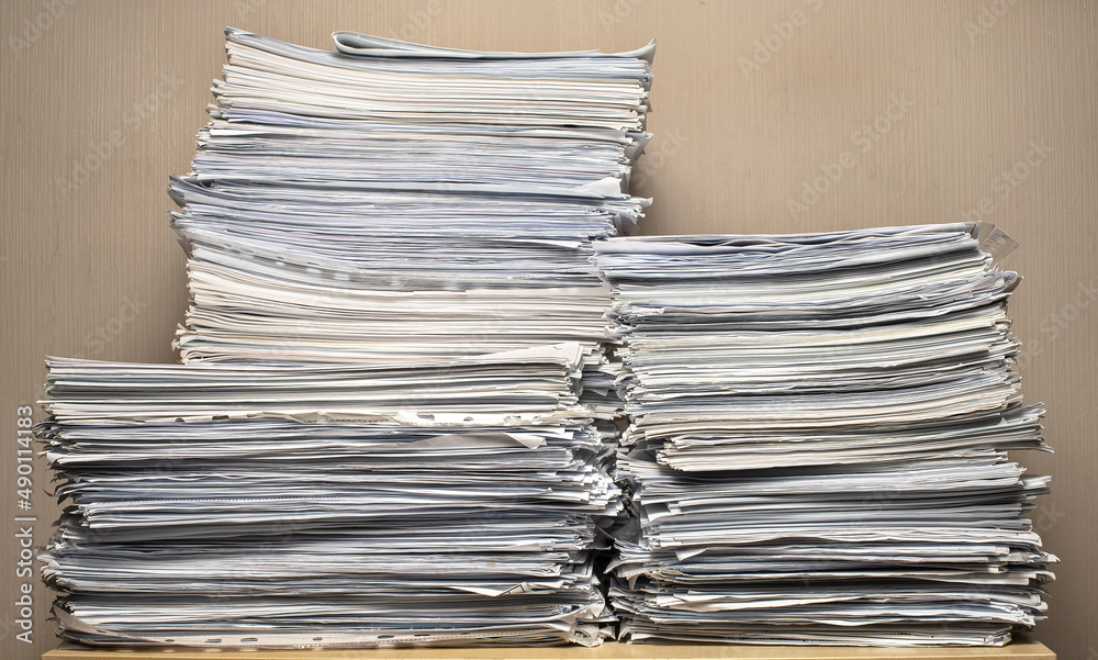 pile of paper documents in the office, paper trash, waste paper