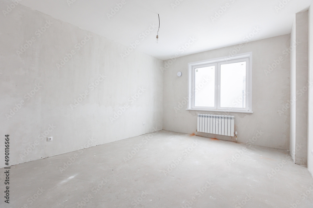 interior of the apartment without decoration in gray colors interior of the apartment without decoration in gray colors