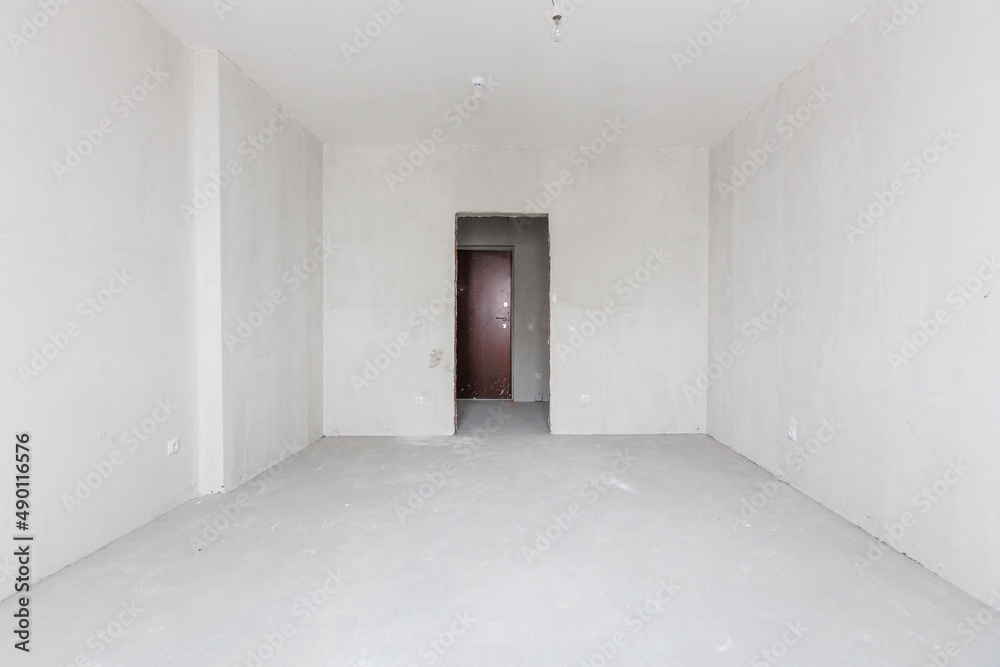 Fototapeta premium interior of the apartment without decoration in gray colors