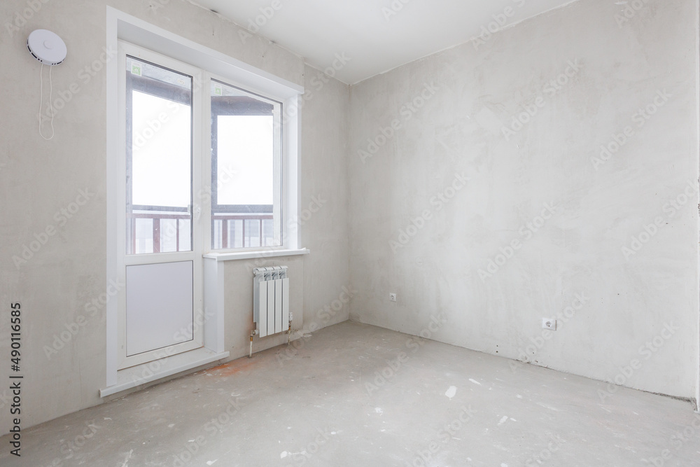 interior of the apartment without decoration in gray colors interior of the apartment without decoration in gray colors