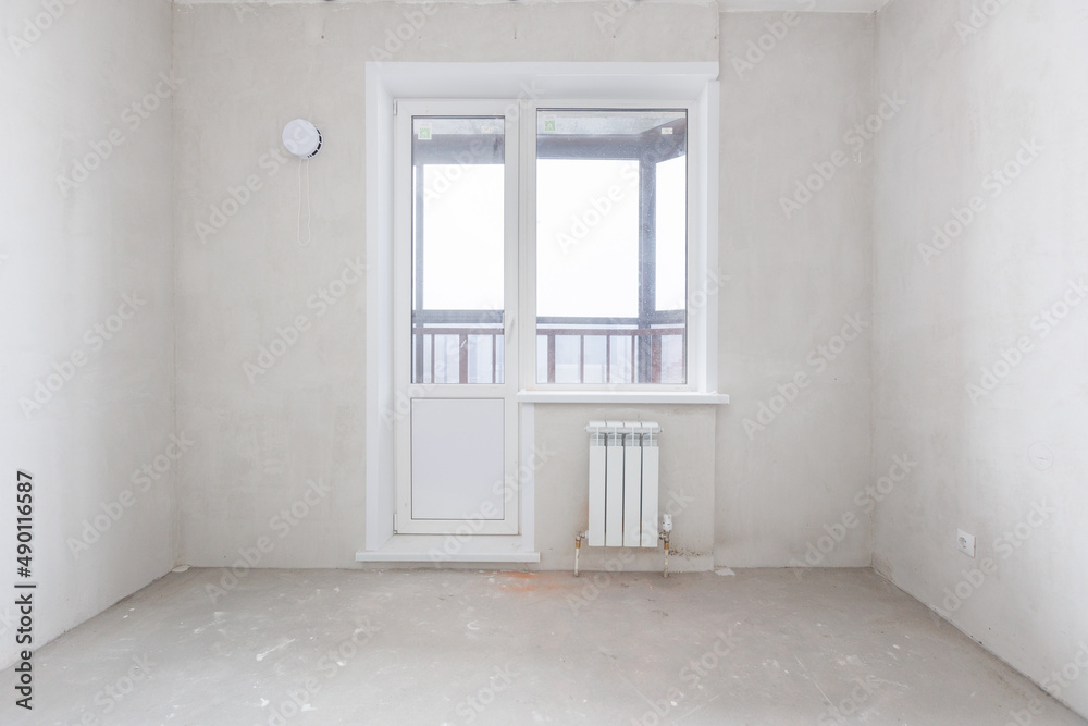 interior of the apartment without decoration in gray colors interior of the apartment without decoration in gray colors