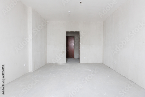 interior of the apartment without decoration in gray colors