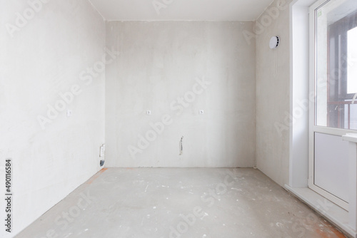 interior of the apartment without decoration in gray colors