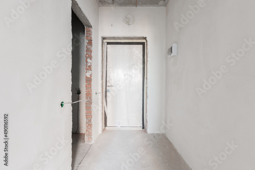 interior of the apartment without decoration in gray colors