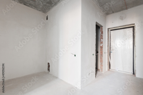 interior of the apartment without decoration in gray colors