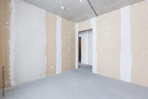 interior of the apartment without decoration in gray colors