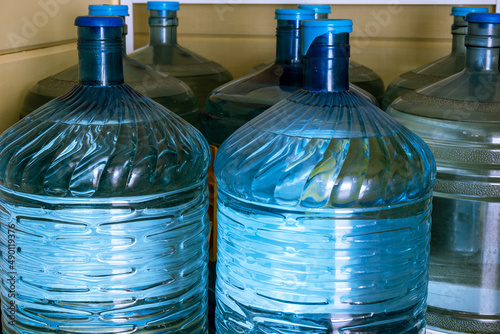 Drinking water bottles. Concept - collection of things during a natural disaster, emergency, quick evacuation during a disaster.