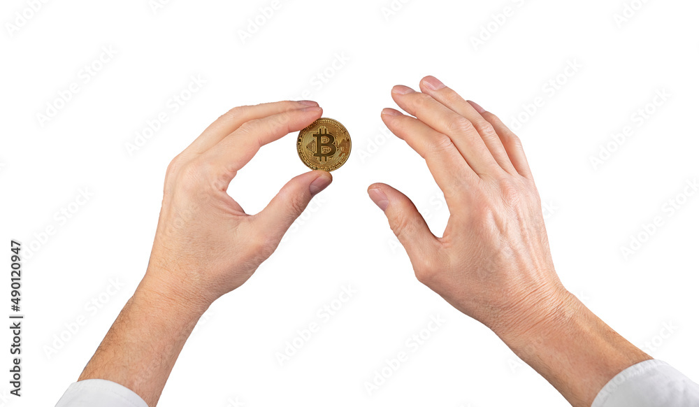 Businessman hand holding bitcoin coin isolated on white background. Cryptocurrency market and virtual money concept. High quality photo Businessman hand holding bitcoin coin isolated on white background. Cryptocurrency market and virtual money concept. High quality photo
