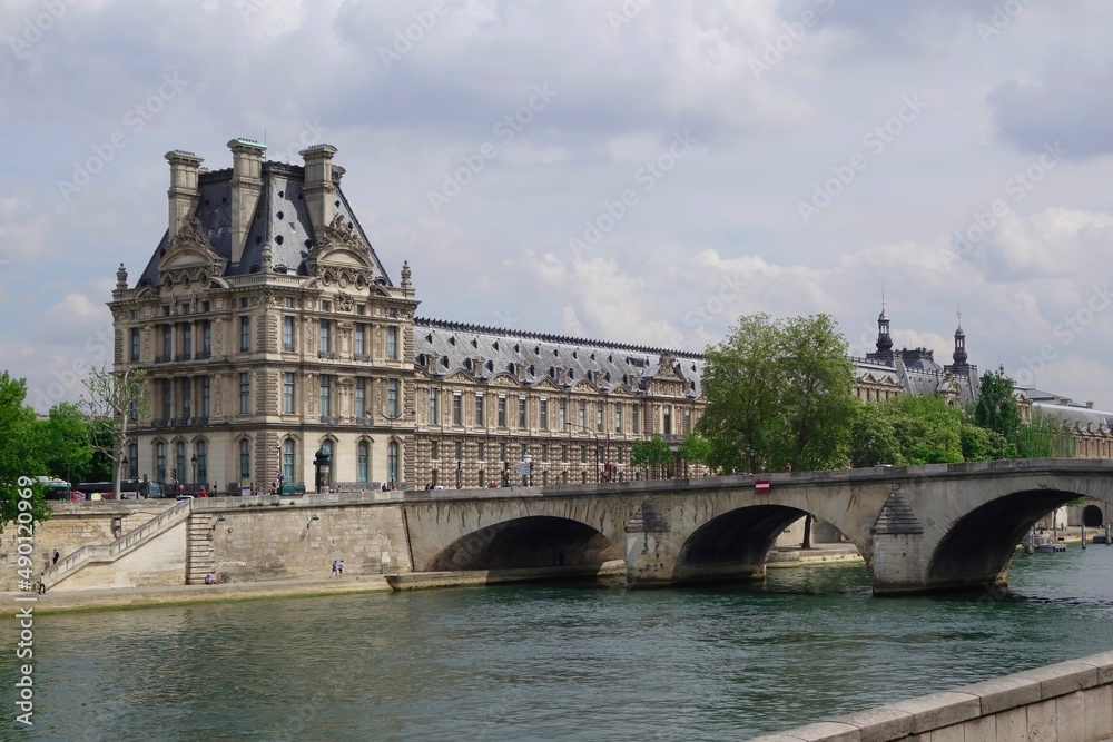 The Louvre at Pont Royal bridge over the Seine, Paris France