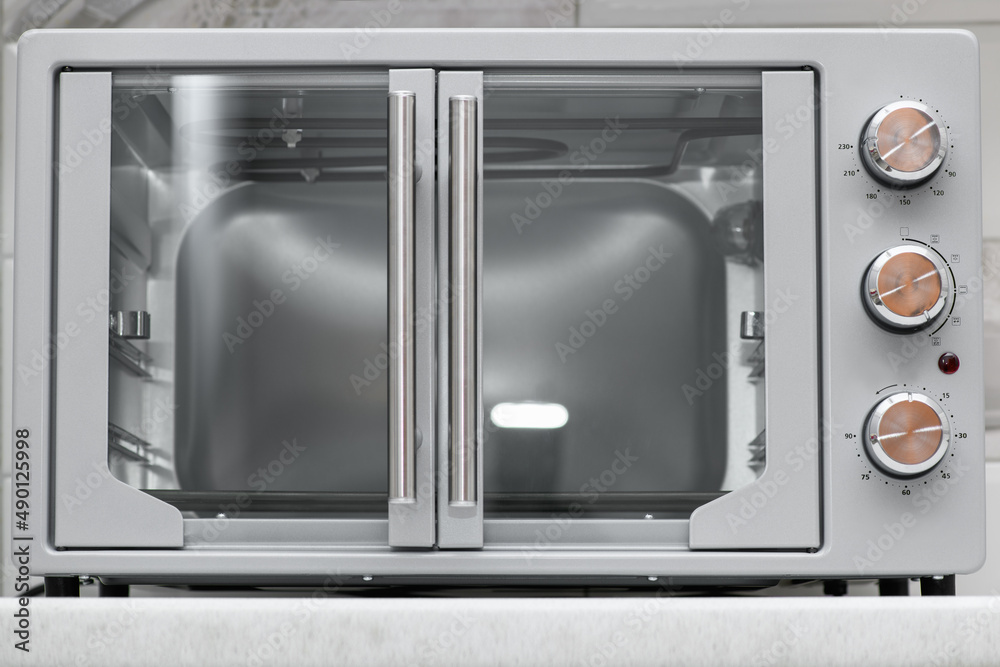 Obraz premium Gray Electric oven appearance. Microwave
