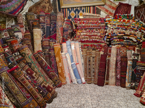 Carpet shop, lots of carpets of different types and sizes.