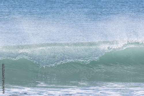 Wave breaking in the sea.