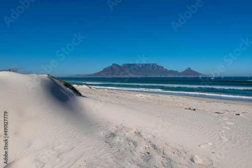 Bloubergstrand beach with a view of Table Mountain in Cape Town photo