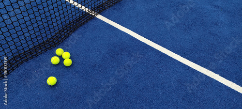 Yellow balls on tennis court © Vicva/Wirestock