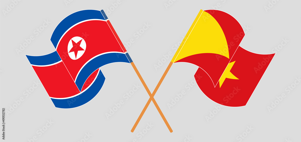 Crossed and waving flags of North Korea and Tigray Crossed and waving flags of North Korea and Tigray