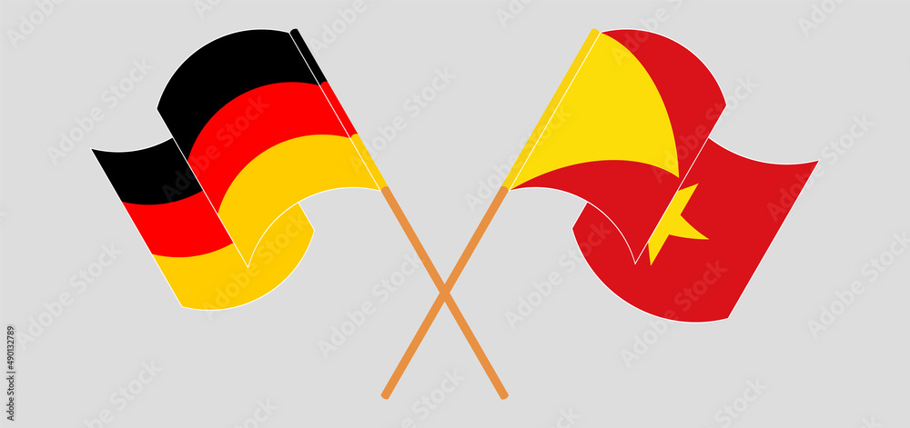 Crossed and waving flags of Germany and Tigray Crossed and waving flags of Germany and Tigray