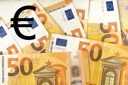 Obraz na płótnie Euro money sign on 50 euro cash banknotes background. 3D rendering illustration of forex, economy and finance concept. w salonie