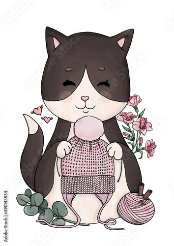 Knitting cat with knitted accessories, yarn balls