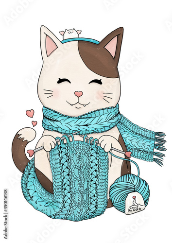 Knitting cat with knitted accessories, yarn balls