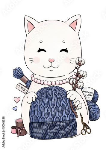 Knitting cat with knitted accessories, yarn balls