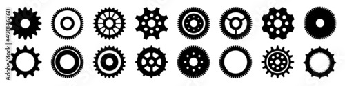 Simple gear icons. Wheels set on black background. Vector white cogwheels collection.  photo