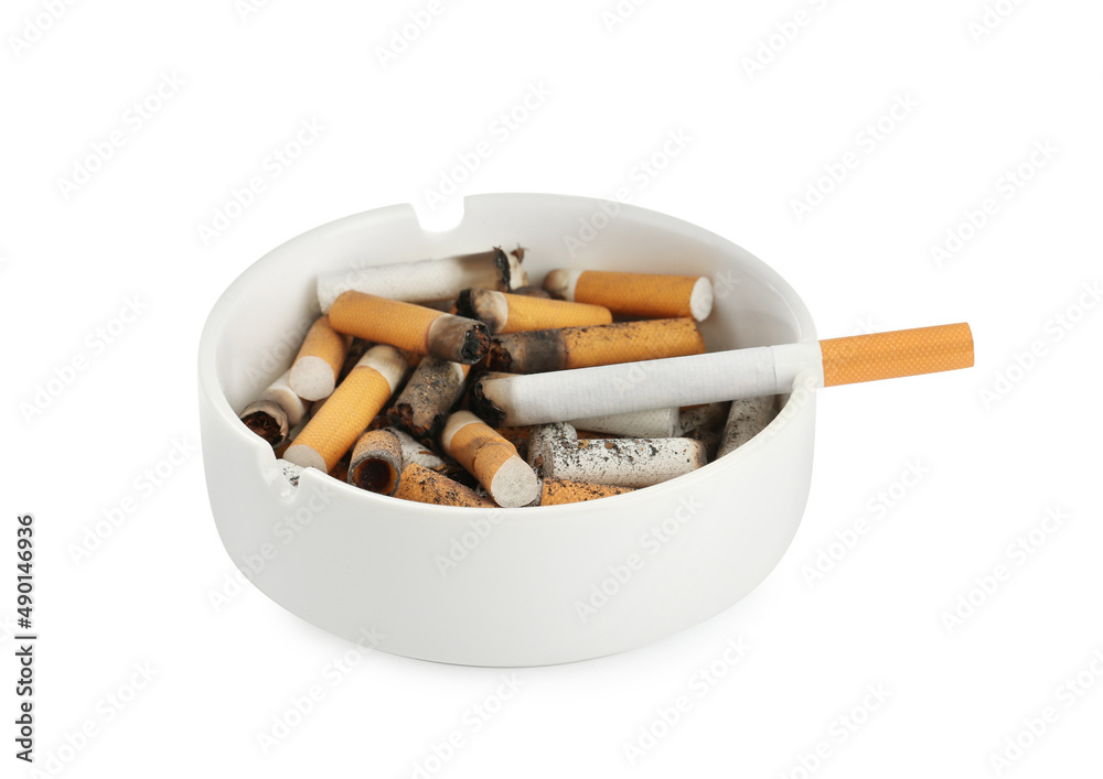 Ceramic ashtray with cigarette stubs isolated on white Ceramic ashtray with cigarette stubs isolated on white