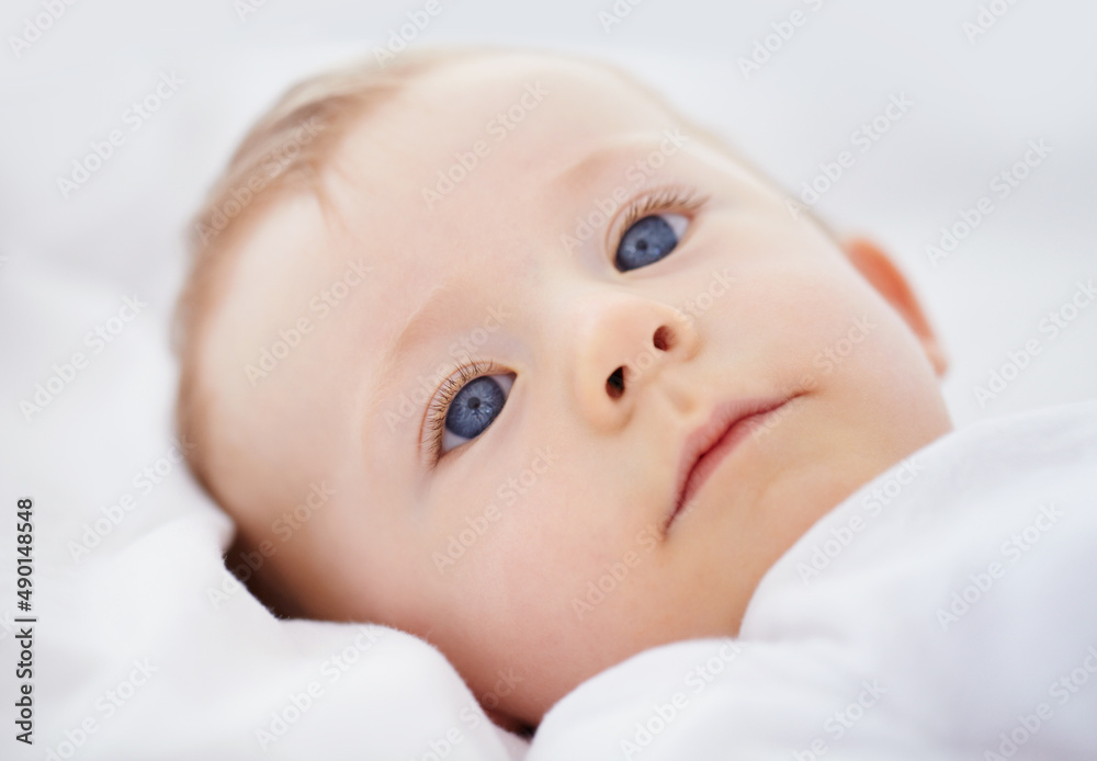What a long day. Closeup shot of an adorable baby lying in his crib. What a long day. Closeup shot of an adorable baby lying in his crib.