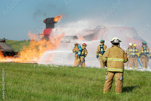 firefighters fighting fire photo