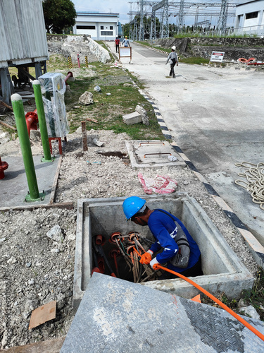 Vertical shot of Cable Pulling activity for Generator at 230KV Substation photo